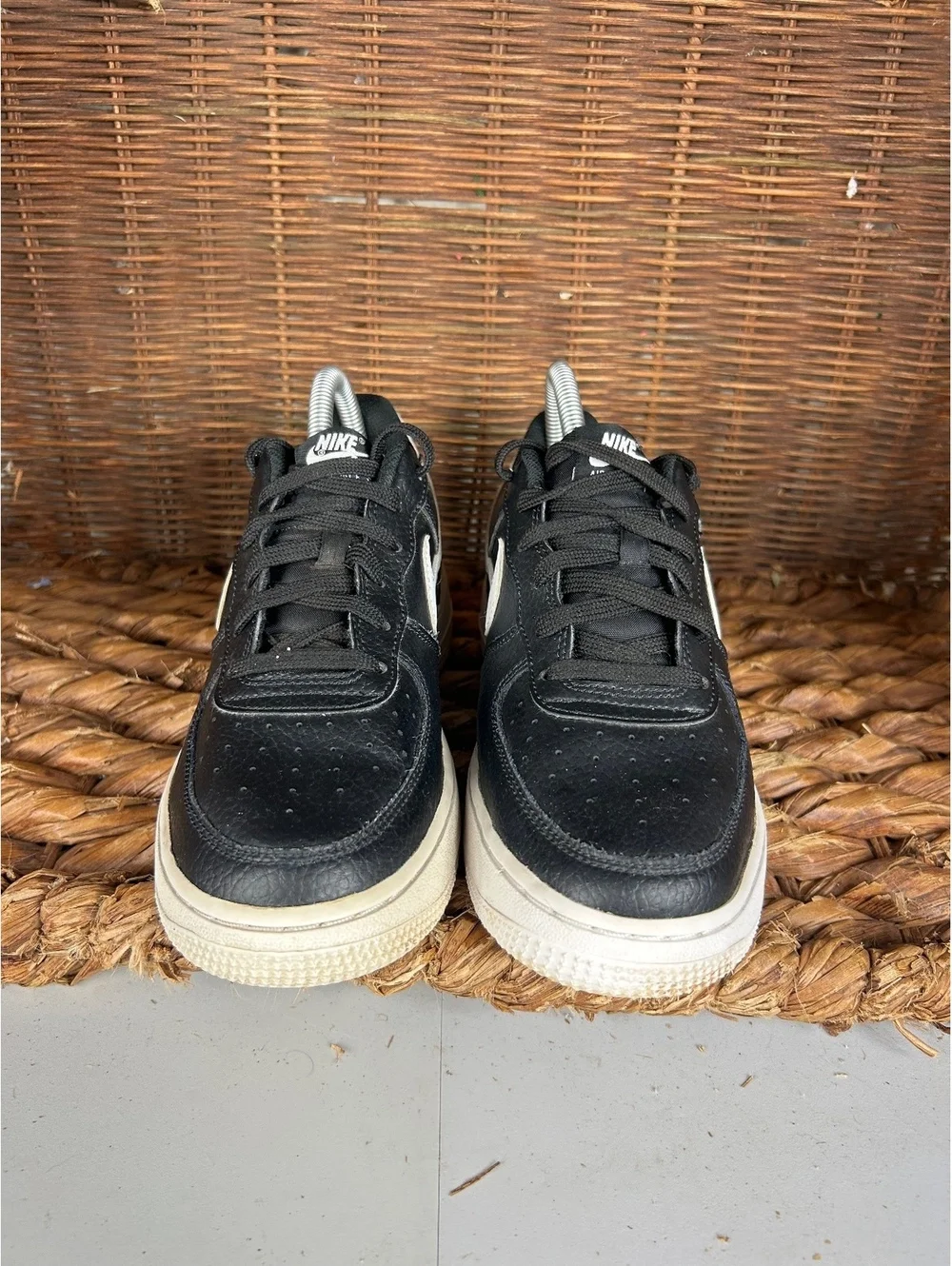 Nike Air Force 1 black and white low sneakers